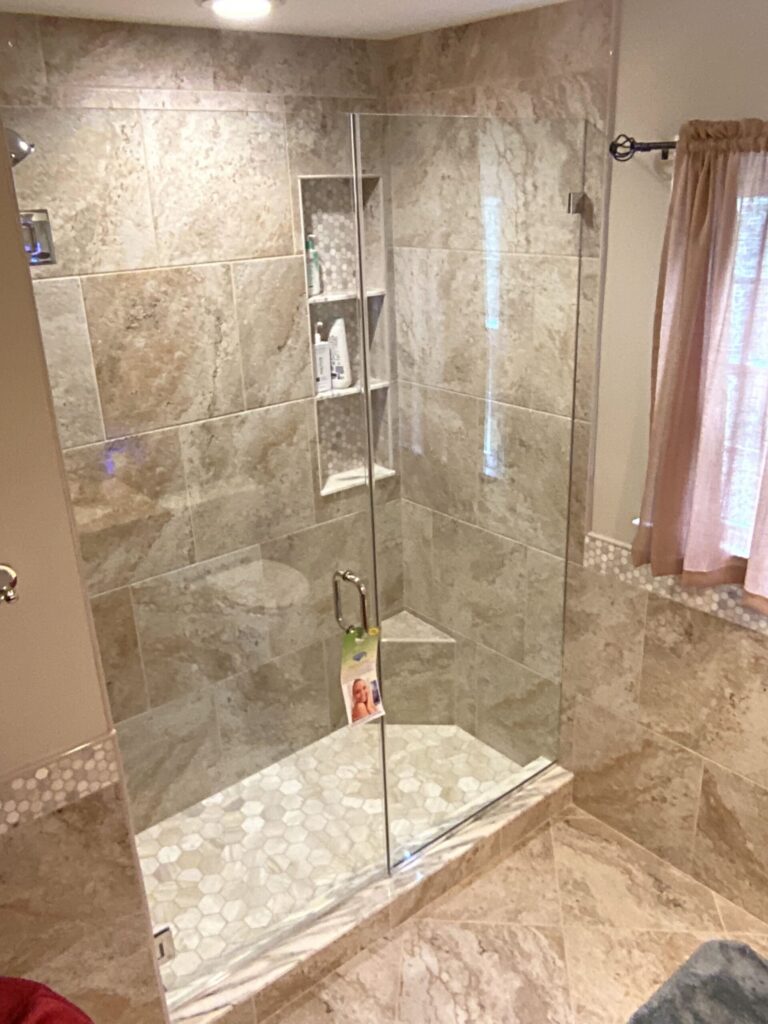 Photo of Swing Door and Panel Hinged on Wall in Alcove Layout with Chrome Hardware Finish