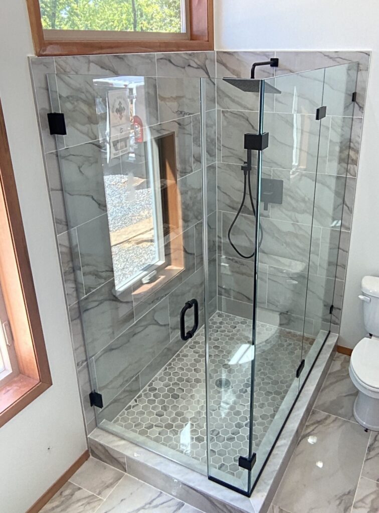 Photo of Swing Door Full Height Corner Unit Hinged on Wall with Matte Black Hardware Finish