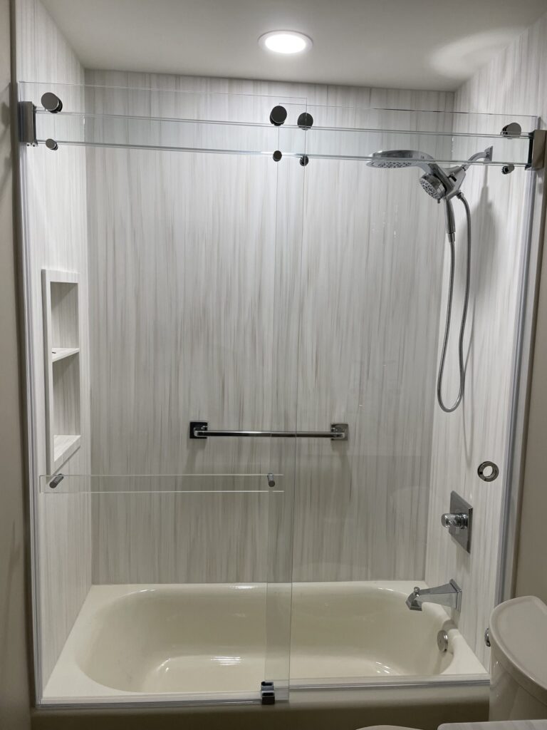 Photo of Sliding Phantom Door on a Tub Layout with Chrome Hardware Finish
